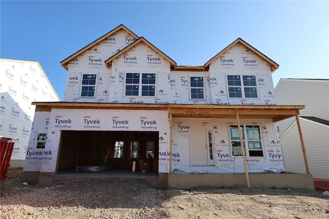 3089 Wellington Ln Unit 8272, Miami Twp, OH 45449 - property in mid-construction with a porch, driveway, and a garage