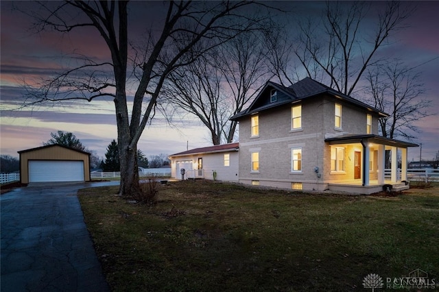 356 Old St Unit 122, Clearcreek Twp, OH 45036 - property exterior at dusk with an outbuilding, a detached garage, and covered porch