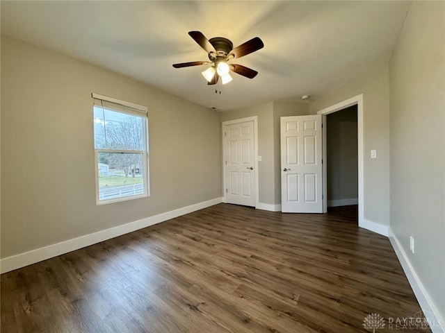 356 Old St Unit 122, Clearcreek Twp, OH 45036 - unfurnished bedroom featuring dark wood-style floors and ceiling fan