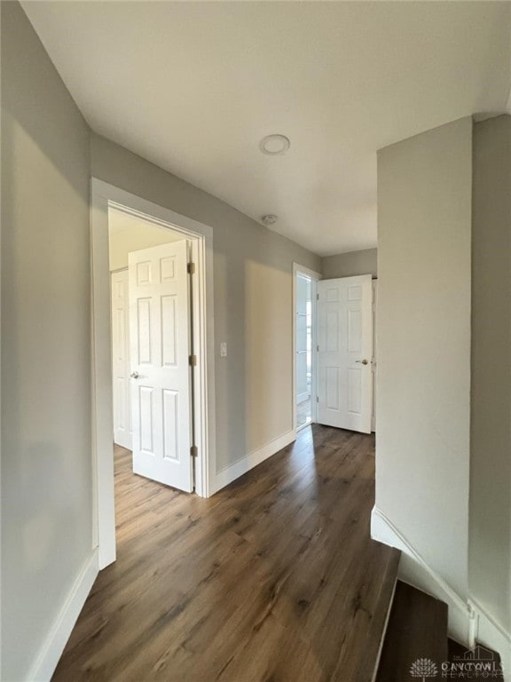 356 Old St Unit 122, Clearcreek Twp, OH 45036 - hallway with dark wood finished floors