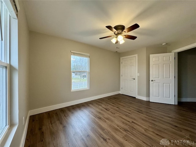 356 Old St Unit 122, Clearcreek Twp, OH 45036 - unfurnished bedroom featuring dark wood-style floors and ceiling fan
