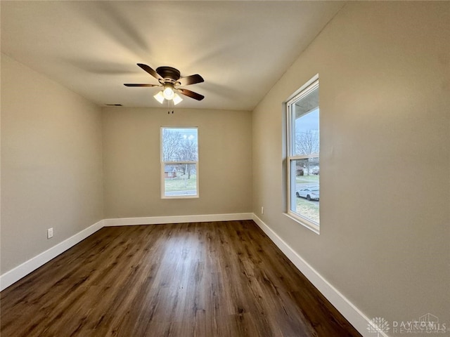 356 Old St Unit 122, Clearcreek Twp, OH 45036 - empty room featuring dark wood-style flooring and a ceiling fan