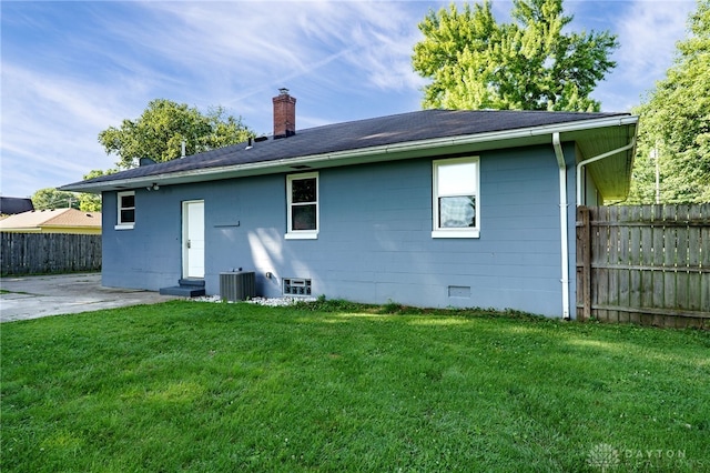 732 Central Ave, Franklin, OH 45005 - back of property featuring a chimney, a patio, and a shingled roof