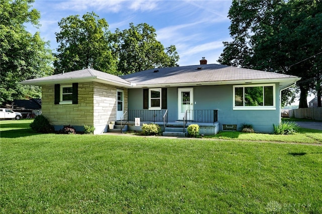 732 Central Ave, Franklin, OH 45005 - view of front of property with a porch, stone siding, a front yard, and a chimney