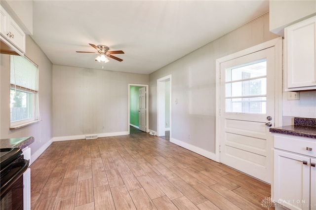 732 Central Ave, Franklin, OH 45005 - unfurnished dining area featuring ceiling fan and light wood-style flooring