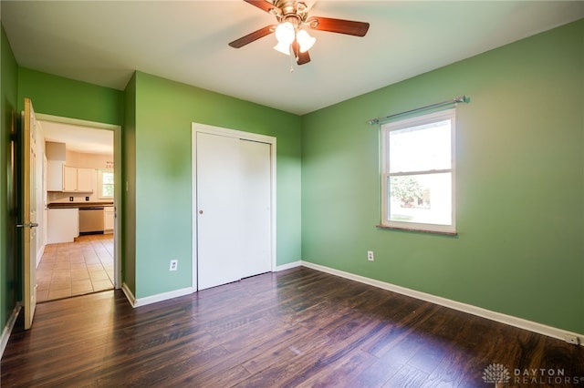 732 Central Ave, Franklin, OH 45005 - unfurnished bedroom with wood finished floors, a closet, and ceiling fan