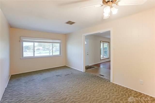 106 Mark Ct, Germantown, OH 45327 - spare room with carpet, healthy amount of natural light, and a ceiling fan