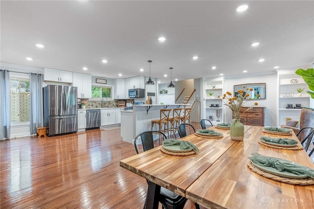 4629 Wicklow Dr, Middletown, OH 45042 - dining room featuring recessed lighting and light wood finished floors