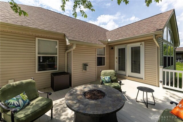 1210 Greystone Cir, Dayton, OH 45414 - wooden deck with a fire pit