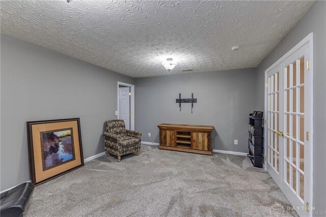 1210 Greystone Cir, Dayton, OH 45414 - sitting room featuring carpet floors and a textured ceiling
