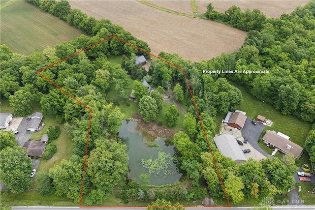 8760 State Route 380, Chester Twp, OH 45177 - aerial view of sparsely populated area with property boundaries highlighted and a nearby body of water