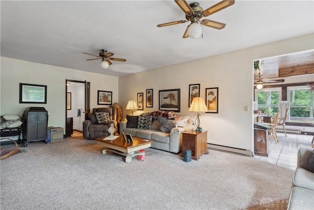 8760 State Route 380, Chester Twp, OH 45177 - carpeted living area featuring a baseboard heating unit and ceiling fan