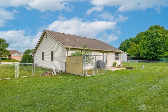 7502 Ned Ct, Franklin, OH 45005 - back of house featuring a gate and a fenced backyard