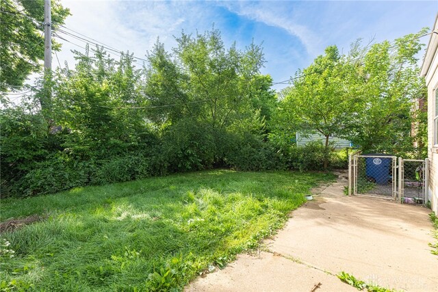 2311 Alpine Way, Dayton, OH 45406 - view of yard featuring a gate
