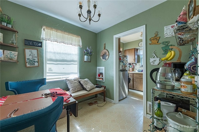 2311 Alpine Way, Dayton, OH 45406 - dining space with a chandelier and light tile patterned floors