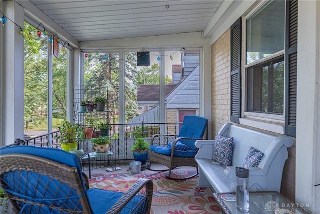 2311 Alpine Way, Dayton, OH 45406 - sunroom featuring vaulted ceiling and healthy amount of natural light