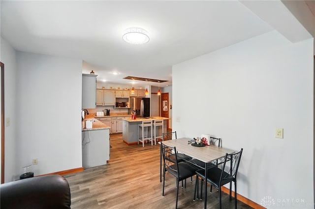 3244 N Shoemaker Rd, Lebanon, OH 45036 - dining room featuring light wood-type flooring and recessed lighting