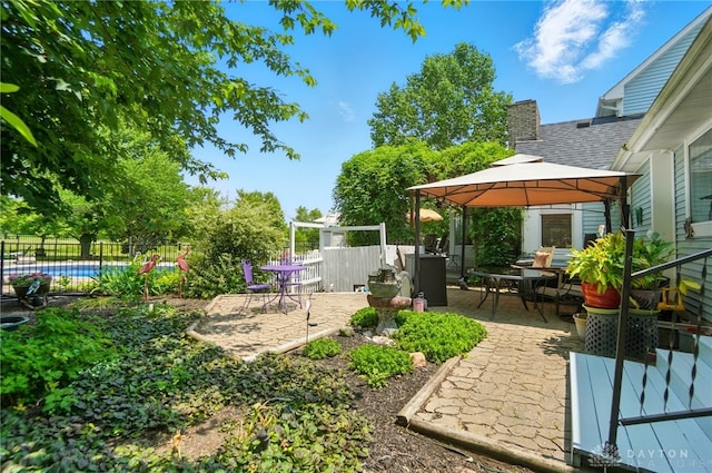 3244 N Shoemaker Rd, Lebanon, OH 45036 - fenced backyard with a patio and outdoor dining area