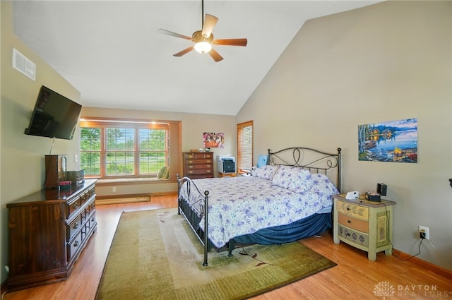 3244 N Shoemaker Rd, Lebanon, OH 45036 - bedroom featuring wood finished floors, high vaulted ceiling, and a ceiling fan
