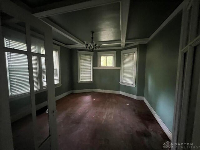 813 S Fred Shuttlesworth Cir, Cincinnati, OH 45229 - spare room with a chandelier and baseboards