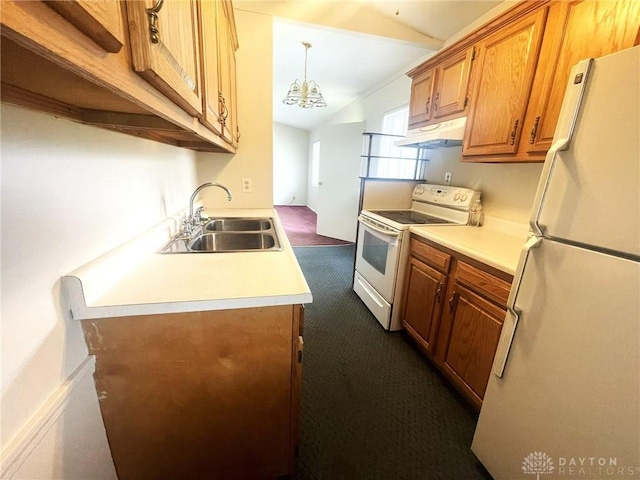 831 Seibert Ave, Miamisburg, OH 45342 - kitchen with white appliances, under cabinet range hood, vaulted ceiling, dark colored carpet, and brown cabinets