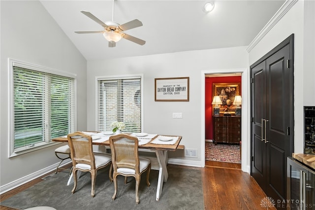 1314 Red Bud Trl, Dayton, OH 45409 - dining room with lofted ceiling, dark wood-style flooring, a ceiling fan, and beverage cooler