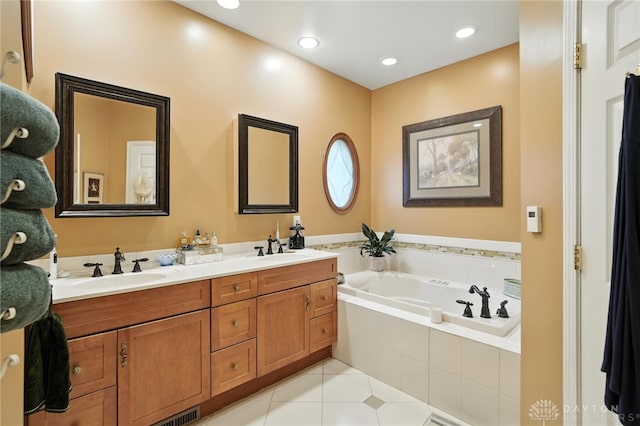 1314 Red Bud Trl, Dayton, OH 45409 - bathroom with double vanity, tile patterned floors, and a garden tub