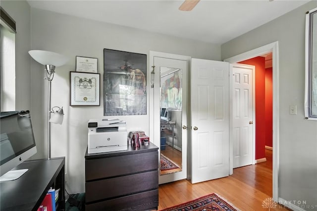 1314 Red Bud Trl, Dayton, OH 45409 - bedroom with wood finished floors, a desk, and a ceiling fan