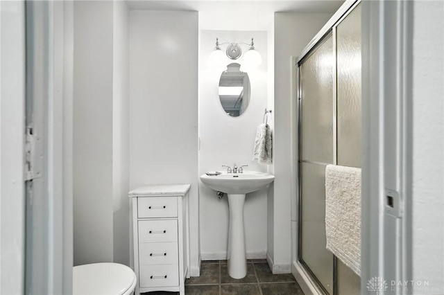 1314 Red Bud Trl, Dayton, OH 45409 - bathroom with a shower stall and tile patterned floors