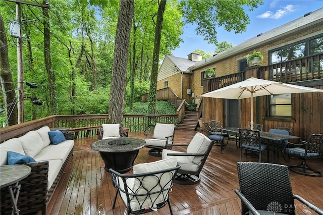 1314 Red Bud Trl, Dayton, OH 45409 - wooden terrace with an outdoor hangout area and outdoor dining area
