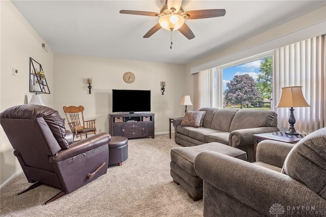 6977 Alternate State Route 49, Arcanum, OH 45304 - living area featuring light colored carpet and a ceiling fan