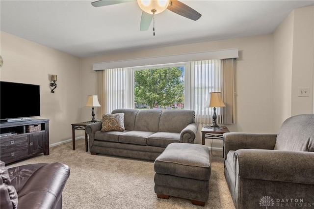 6977 Alternate State Route 49, Arcanum, OH 45304 - carpeted living area with ceiling fan and baseboards