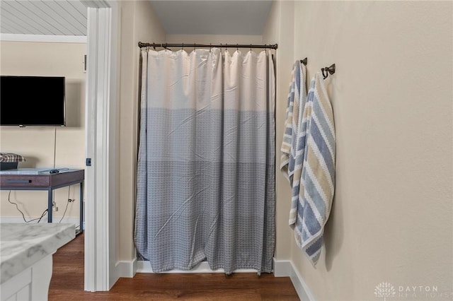 6977 Alternate State Route 49, Arcanum, OH 45304 - full bathroom featuring wood finished floors and curtained shower