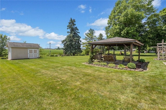 6977 Alternate State Route 49, Arcanum, OH 45304 - view of green lawn featuring a gazebo and a storage shed