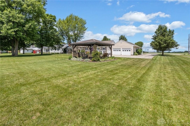 6977 Alternate State Route 49, Arcanum, OH 45304 - view of green lawn featuring a gazebo and a garage