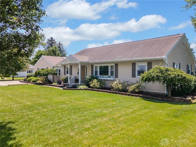 6977 Alternate State Route 49, Arcanum, OH 45304 - single story home featuring a front lawn and roof with shingles
