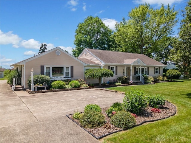 6977 Alternate State Route 49, Arcanum, OH 45304 - single story home featuring a porch and a front lawn