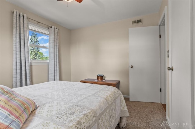 6977 Alternate State Route 49, Arcanum, OH 45304 - carpeted bedroom featuring baseboards and ceiling fan