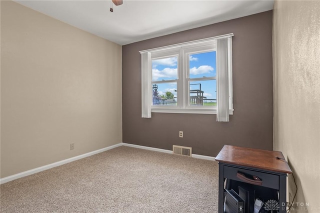6977 Alternate State Route 49, Arcanum, OH 45304 - spare room featuring carpet floors and a ceiling fan