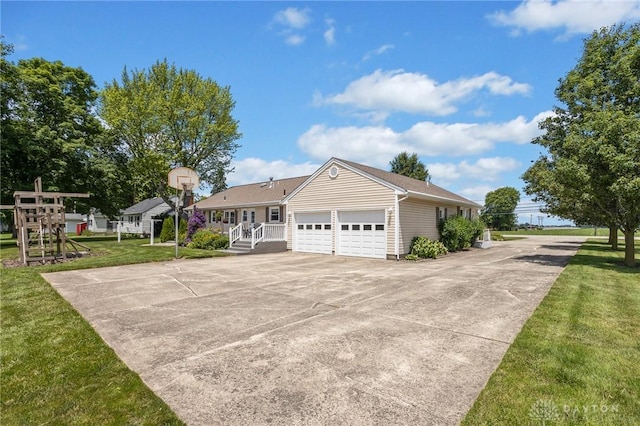 6977 Alternate State Route 49, Arcanum, OH 45304 - single story home with a front lawn, an attached garage, and driveway