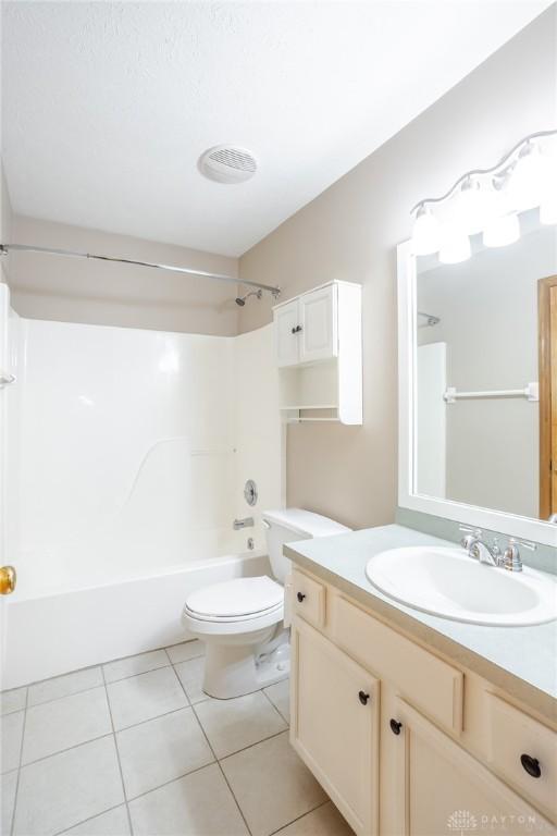 6437 Sun Ridge Dr, Waynesville, OH 45068 - full bath with vanity, shower / bathtub combination, and tile patterned flooring
