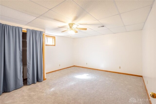 6437 Sun Ridge Dr, Waynesville, OH 45068 - carpeted spare room with a paneled ceiling and a ceiling fan