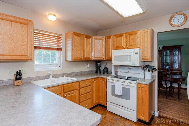 2384 Flyway Ct, Beavercreek, OH 45431 - kitchen with white appliances, light countertops, and light brown cabinetry