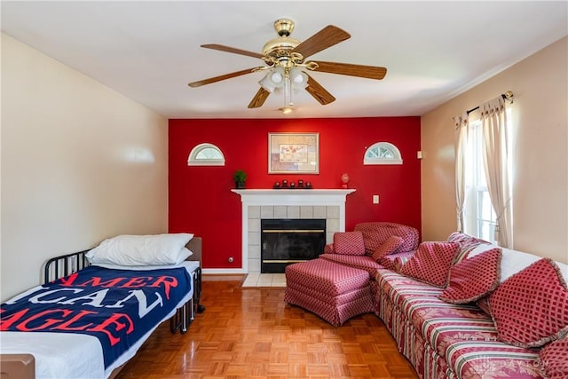 2384 Flyway Ct, Beavercreek, OH 45431 - living room featuring ceiling fan and a tile fireplace
