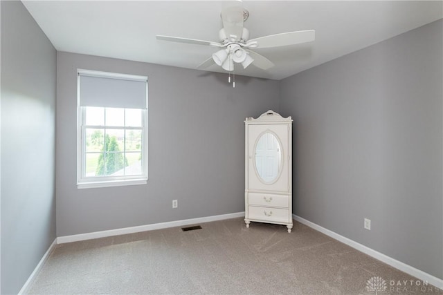 2384 Flyway Ct, Beavercreek, OH 45431 - carpeted spare room featuring a ceiling fan and baseboards