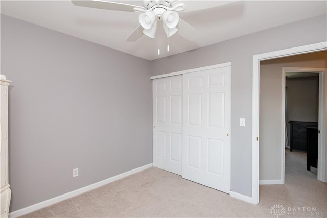 2384 Flyway Ct, Beavercreek, OH 45431 - unfurnished bedroom featuring light carpet, a closet, and ceiling fan