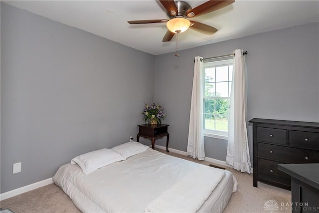 2384 Flyway Ct, Beavercreek, OH 45431 - bedroom featuring light carpet and ceiling fan