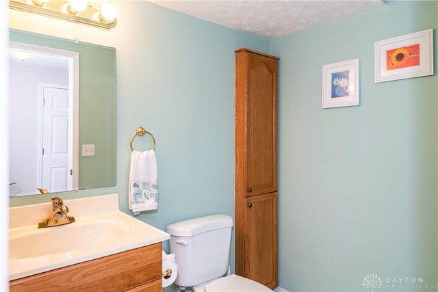 2384 Flyway Ct, Beavercreek, OH 45431 - bathroom featuring vanity and a textured ceiling