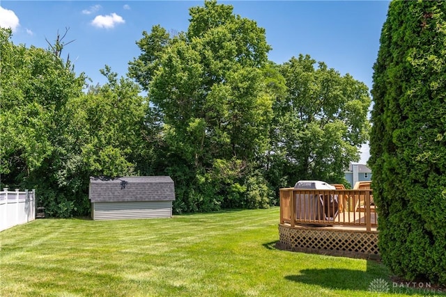 2384 Flyway Ct, Beavercreek, OH 45431 - view of yard featuring a storage shed and a wooden deck