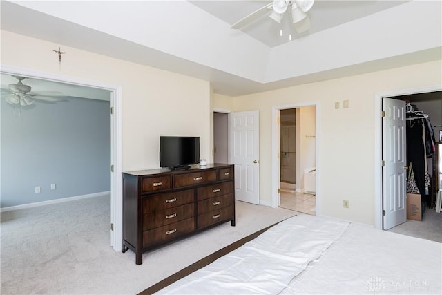2384 Flyway Ct, Beavercreek, OH 45431 - bedroom with a walk in closet, light carpet, a closet, a ceiling fan, and ensuite bathroom